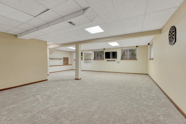 17390 E Greenwood Cir, Aurora, CO 80013 - basement featuring carpet, baseboards, and a drop ceiling