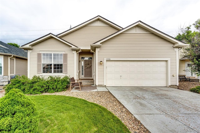 22026 Hill Gail Way, Parker, CO 80138 - view of front of house with driveway, a garage, and a front yard