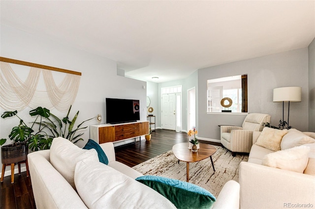 22026 Hill Gail Way, Parker, CO 80138 - living room with dark wood-style floors and baseboards