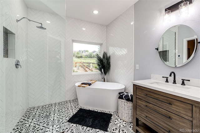 22026 Hill Gail Way, Parker, CO 80138 - bathroom featuring vanity, a freestanding bath, and a tile shower