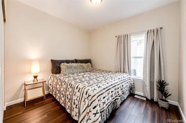 22026 Hill Gail Way, Parker, CO 80138 - bedroom with dark wood-style floors and baseboards