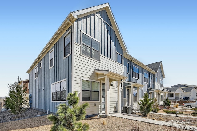 view of front of home with board and batten siding and a residential view