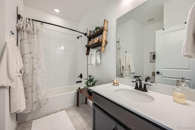 bathroom featuring shower / bath combo, visible vents, tile patterned flooring, and vanity