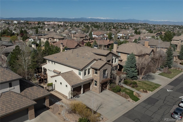 bird's eye view with a mountain view and a residential view