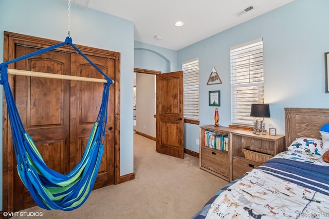bedroom featuring recessed lighting, carpet floors, visible vents, and baseboards