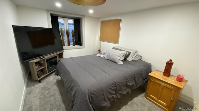 bedroom with recessed lighting, baseboards, and carpet