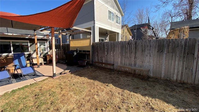 view of yard featuring a patio area and fence