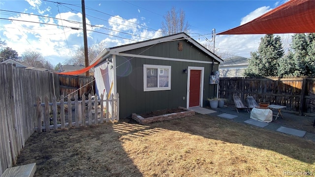 view of outbuilding featuring a fenced backyard