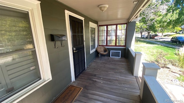 wooden deck featuring covered porch