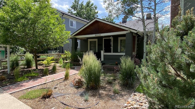 2033 S Ogden St, Denver, CO 80210 - view of front of property with covered porch