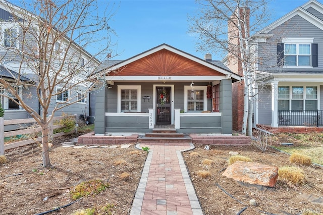2033 S Ogden St, Denver, CO 80210 - view of front of house with a porch