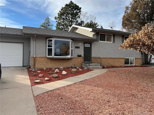 split level home with a garage