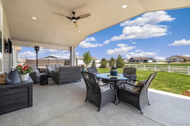 view of patio / terrace with outdoor lounge area, outdoor dining area, and ceiling fan