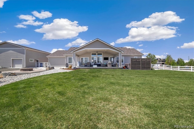 back of house with a patio and ceiling fan