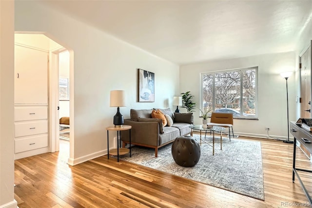 living area with light hardwood / wood-style flooring