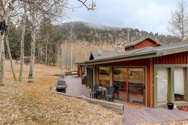 2720 S Spring Gulch Rd, Idaho Springs, CO 80452 - view of yard with a deck and a forest view