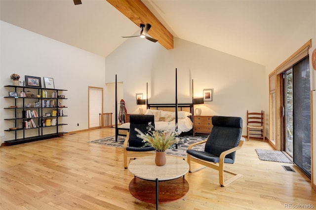 2720 S Spring Gulch Rd, Idaho Springs, CO 80452 - sitting room featuring ceiling fan, light wood-style floors, high vaulted ceiling, and beamed ceiling