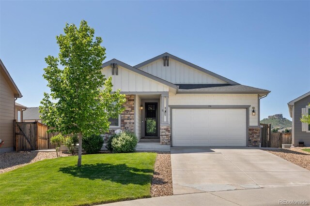 398 Midden Pl, Castle Rock, CO 80104 - view of front of home featuring board and batten siding, a garage, and concrete driveway