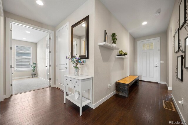 398 Midden Pl, Castle Rock, CO 80104 - foyer entrance with dark wood-style floors and recessed lighting