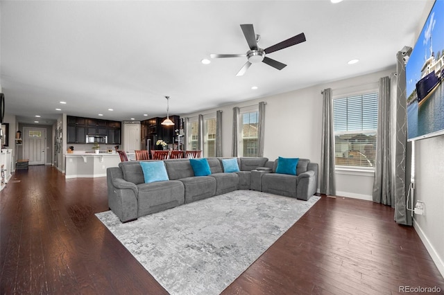 398 Midden Pl, Castle Rock, CO 80104 - living area featuring a ceiling fan, recessed lighting, and dark wood-type flooring