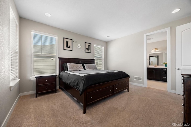 398 Midden Pl, Castle Rock, CO 80104 - bedroom featuring light colored carpet, ensuite bathroom, and recessed lighting