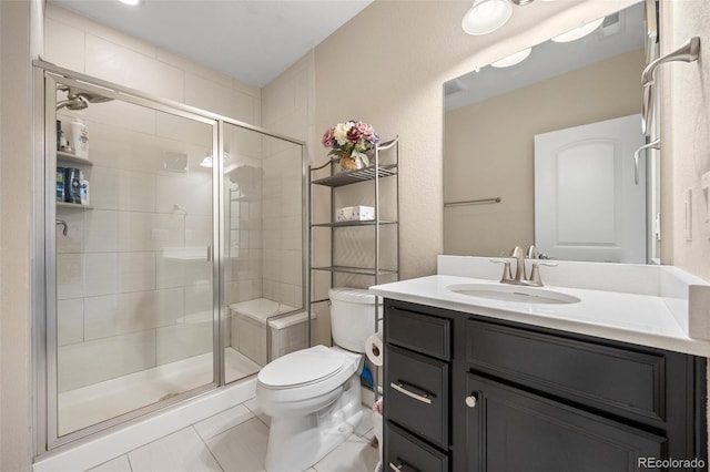 398 Midden Pl, Castle Rock, CO 80104 - full bathroom with tile patterned flooring, a shower stall, and vanity