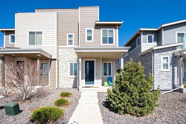 view of front facade featuring stone siding