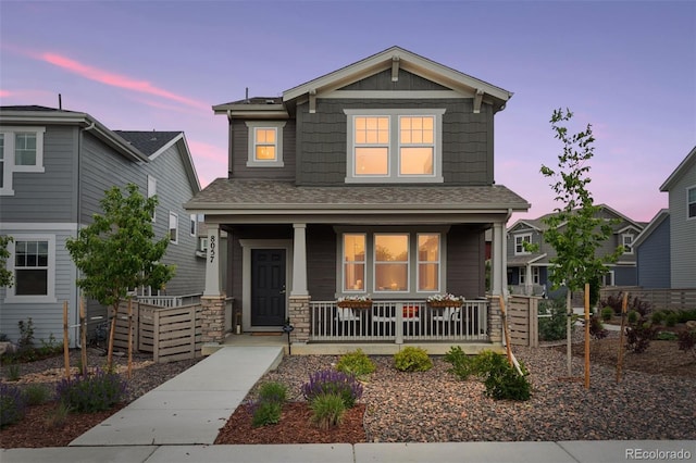 8057 Monte Vista Cir, Littleton, CO 80125 - craftsman inspired home featuring covered porch and a shingled roof
