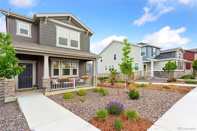 8057 Monte Vista Cir, Littleton, CO 80125 - craftsman inspired home with covered porch and board and batten siding