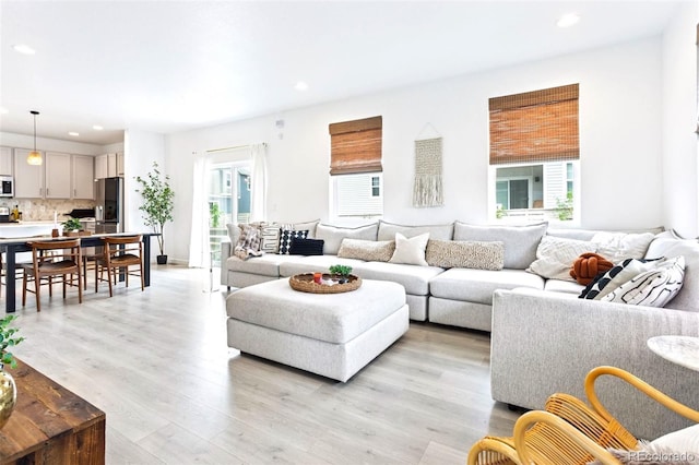8057 Monte Vista Cir, Littleton, CO 80125 - living room featuring recessed lighting and light wood-style floors