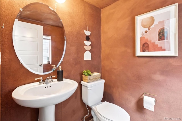 8057 Monte Vista Cir, Littleton, CO 80125 - bathroom featuring toilet and a sink