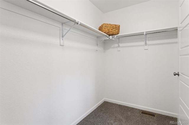 8057 Monte Vista Cir, Littleton, CO 80125 - walk in closet with carpet floors