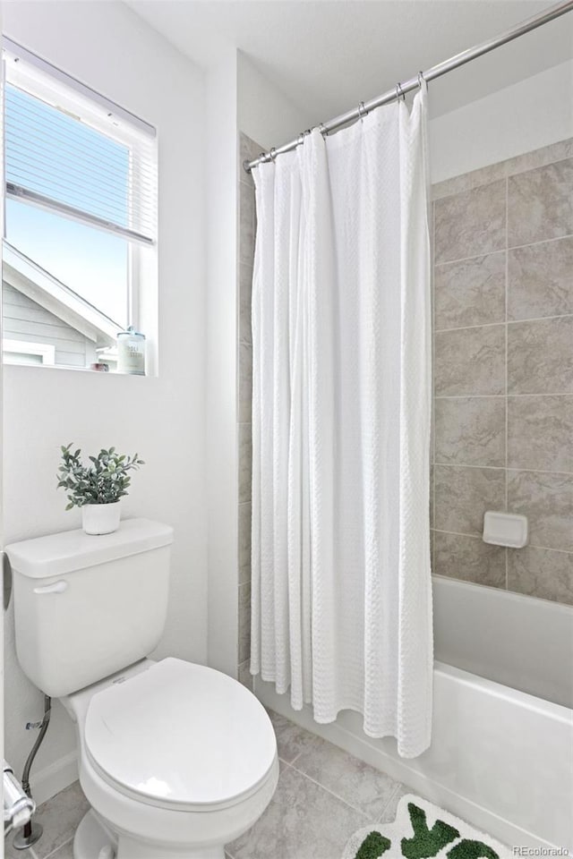 8057 Monte Vista Cir, Littleton, CO 80125 - bathroom featuring tile patterned floors, toilet, and shower / bath combo