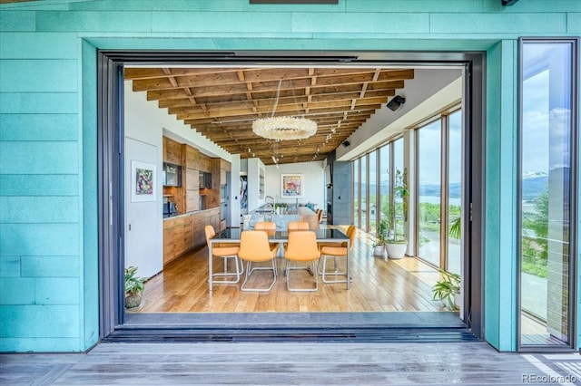 421 Z Rd, Silverthorne, CO 80498 - dining area featuring wood-type flooring and a chandelier