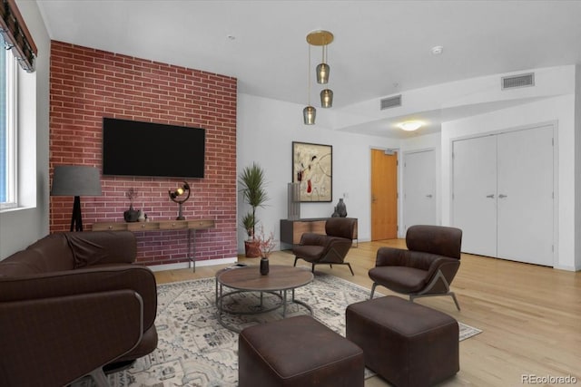 1438 Little Raven St Unit 201, Denver, CO 80202 - living room featuring wood finished floors