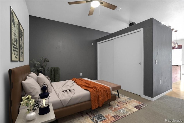 1438 Little Raven St Unit 201, Denver, CO 80202 - bedroom featuring carpet floors, a closet, and a ceiling fan