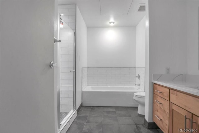 1438 Little Raven St Unit 201, Denver, CO 80202 - bathroom featuring vanity, a garden tub, a stall shower, and tile patterned floors