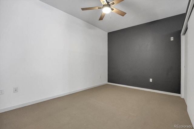 1438 Little Raven St Unit 201, Denver, CO 80202 - spare room featuring ceiling fan and carpet