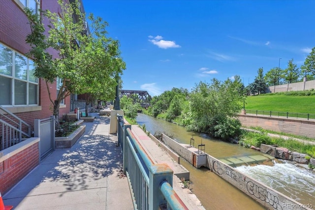 1438 Little Raven St Unit 201, Denver, CO 80202 - view of community featuring a water view