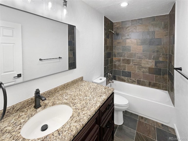5480 W 74th Ave, Arvada, CO 80003 - full bathroom featuring toilet, washtub / shower combination, and vanity