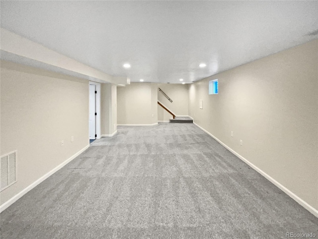 5480 W 74th Ave, Arvada, CO 80003 - finished below grade area featuring recessed lighting, carpet floors, baseboards, and stairway