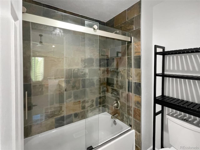 5480 W 74th Ave, Arvada, CO 80003 - bathroom with shower / bath combination with glass door, toilet, and ceiling fan