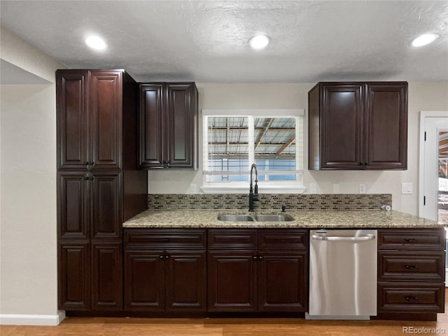 5480 W 74th Ave, Arvada, CO 80003 - kitchen with dishwasher, a sink, dark brown cabinets, decorative backsplash, and recessed lighting
