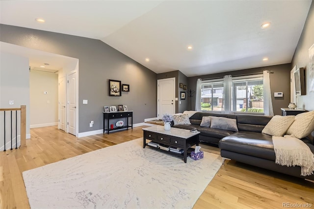 904 Fieldstone Pl, Highlands Ranch, CO 80126 - living area featuring light wood-style flooring, lofted ceiling, recessed lighting, and baseboards