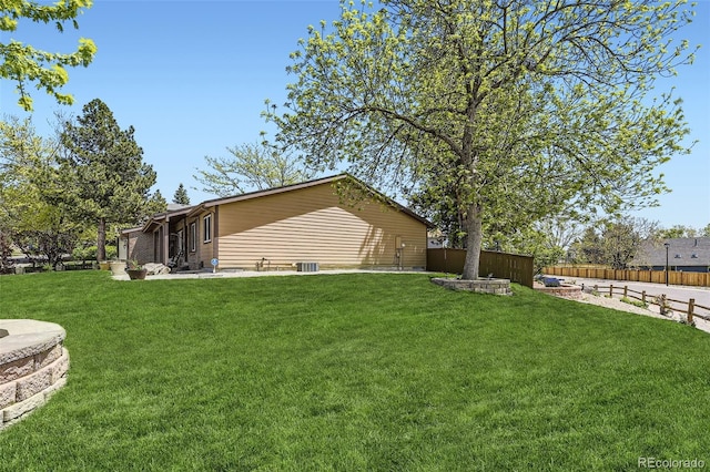 904 Fieldstone Pl, Highlands Ranch, CO 80126 - back of house featuring central AC unit and a patio