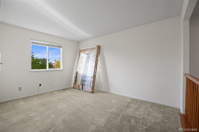 3087 Deer Creek Trl, Highlands Ranch, CO 80129 - carpeted spare room featuring baseboards