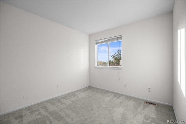 3087 Deer Creek Trl, Highlands Ranch, CO 80129 - unfurnished room with light carpet and baseboards