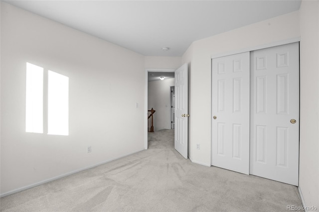 3087 Deer Creek Trl, Highlands Ranch, CO 80129 - unfurnished bedroom featuring carpet, baseboards, and a closet