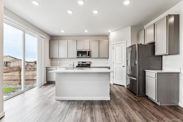 14440 Ranch St, Mead, CO 80504 - kitchen with gray cabinets, healthy amount of natural light, and recessed lighting