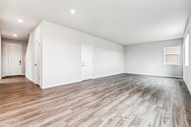 14440 Ranch St, Mead, CO 80504 - spare room featuring wood finished floors and recessed lighting
